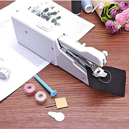 Electric Handy Stitch Mini Hand Sewing Machine Stapler Style Mini Machine Home Tailoring Silai Machine Emergency Stitching Handheld Sewing Machine For Emergency Stitching (1)
